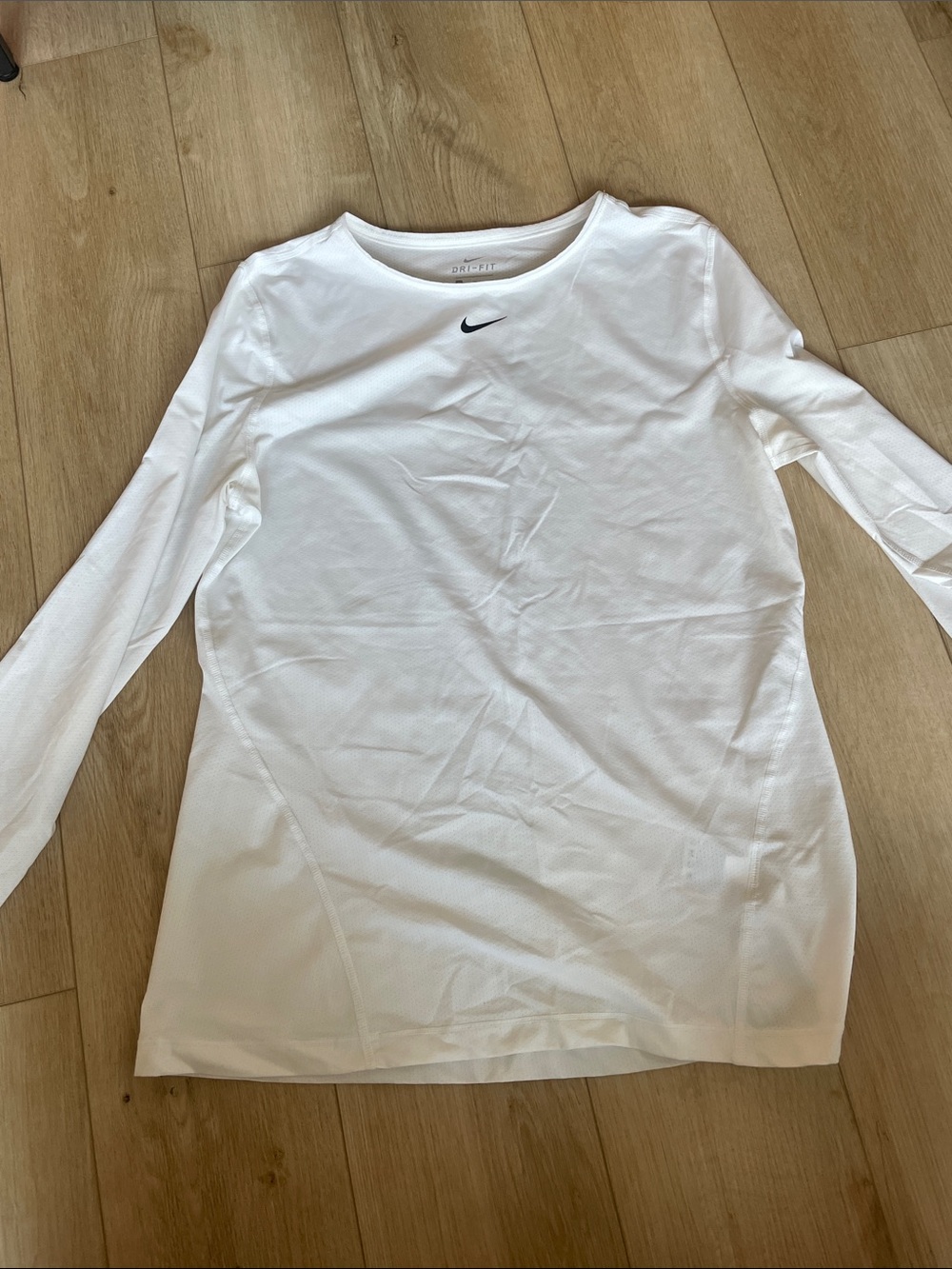 Nike Dri-Fit White Long Sleeve Performance Top with Black Swoosh